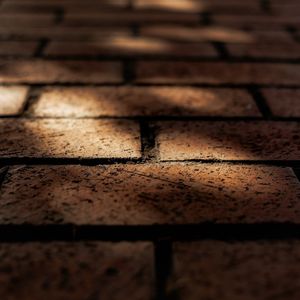 Abstract light patterns reflecting on a yoga floor.